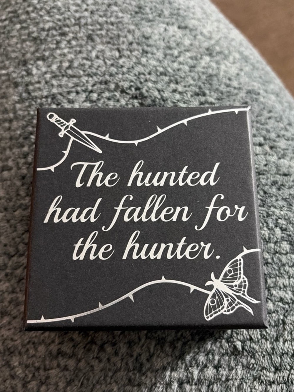The hunted had fallen for the hunter. Wall Plaque - Black
